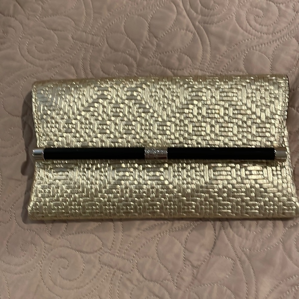 DVF gold clutch